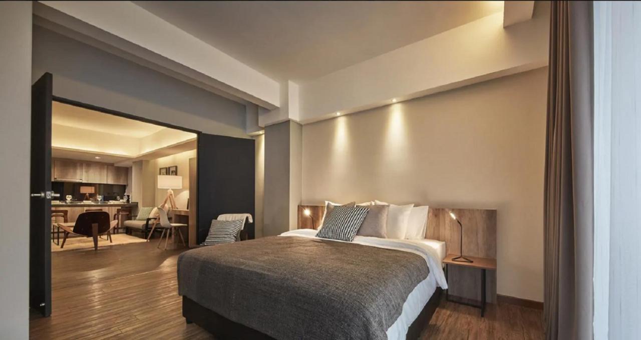 Tropics Eight Suites Hotel